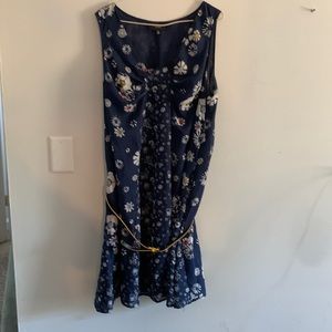 Blue light fabric with flowers with yellow belt